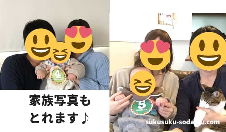 月齢ステッカーを貼っている赤ちゃんと家族